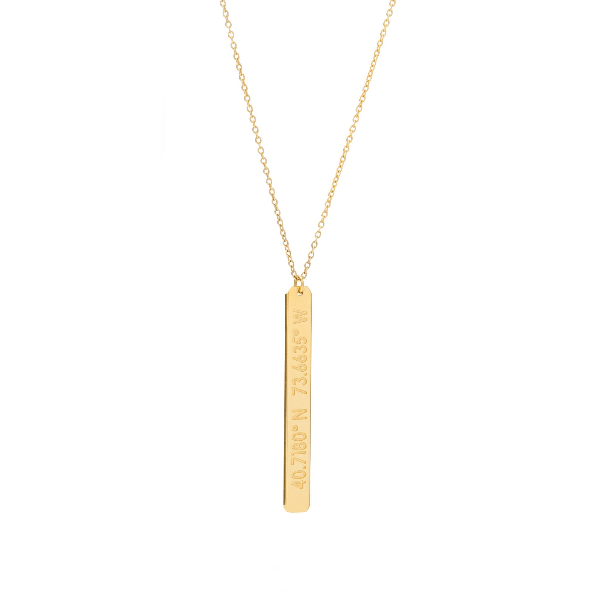 A long gold vertical pendant with inscription on gold chain