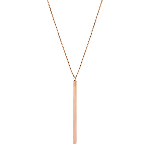 A long slender vertical gold pendant with inscription on a gold chain